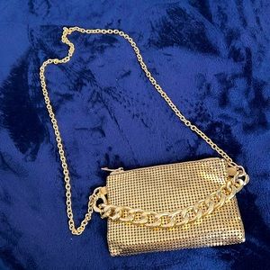 Gold mini bag.